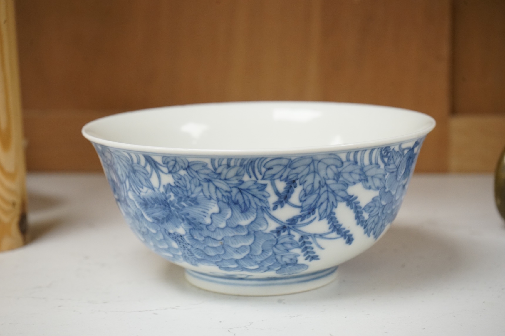A Chinese blue and white bowl, decorated with flowers and birds, 14.5cm in diameter